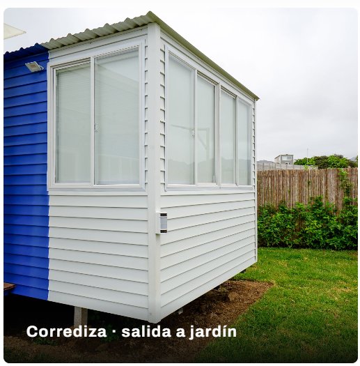 Ventana corrediza de PVC con salida al jardín